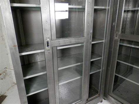 There is something elegant and beautiful about glass kitchen cabinet doors. Single Industrial Metal Cabinet w/ Sliding Glass Doors at ...