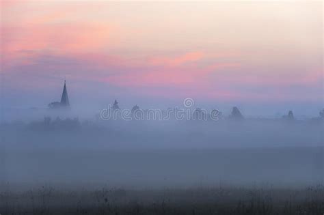 Church Tower And Village In Fog At Dawn Stock Image Image Of Germany