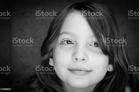 Black And White Contemplative Tween Girl Portrait Stock Photo