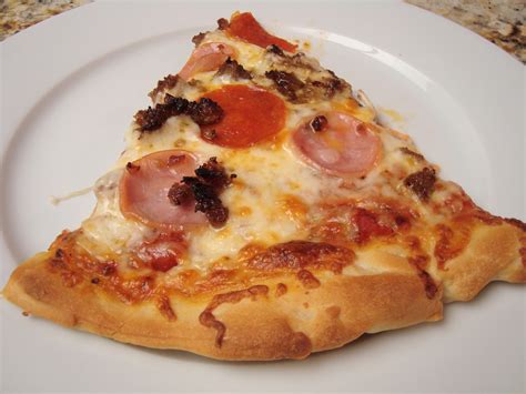 This type of pizza dough contains water, flour, salt, instant yeast, and olive oil (and sugar especially when baking in a home oven, to help browning). A Little Cooking: New York Pizza Crust