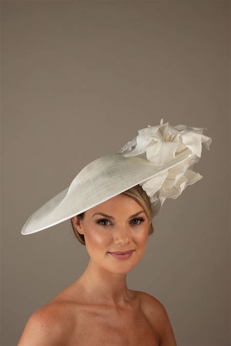 The Tropez Dish Hat Comprises A Dish Base Trimmed To One Side With Silk
