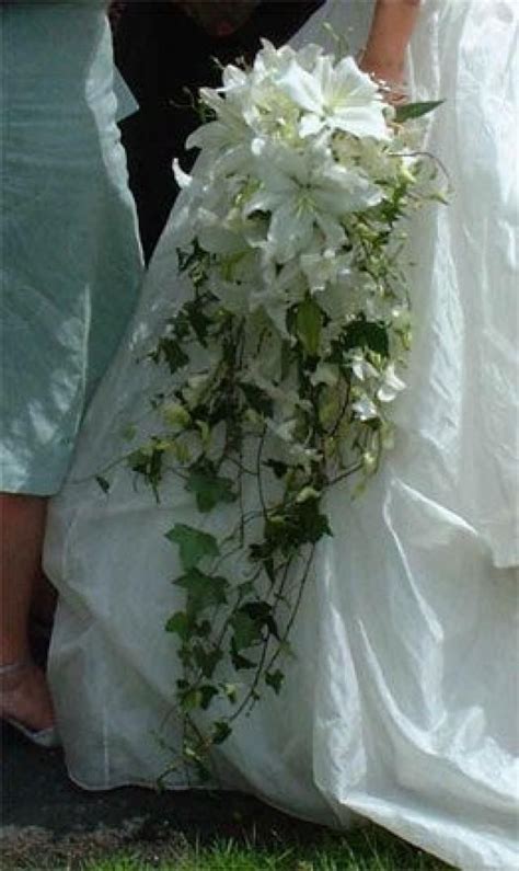 Calla lily bridesmaid bouquet red bouquet wedding bride bouquets red wedding flowers calla lily boutonniere boutonnieres purple wedding bridesmaid the callas lilies are soft to touch and look so real, you are sure to love them. See more about white lilies, wedding bouquets and lily ...
