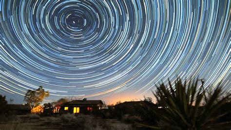 4k Star Trails Night Sky Cosmos Galaxy Time Lapse Over Cabin Sunrise