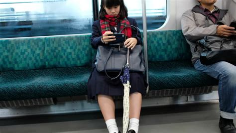 tokyo japan november 12th 2017 japanese girl sleeping in japan railway train stock footage