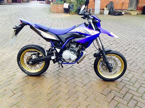 Having trouble finding the best 125cc dirt bike? Yamaha WR125X, registration 2009, blue, 125cc, supermoto.