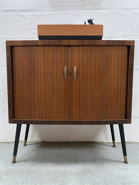 This is a magnavox 1st626a date code 46th week of 1962. Vintage Mid Century Tambour Door Record / Storage Cabinet
