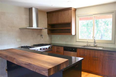They have a variety of door, wood, and finish options to choose from. contemporary walnut kitchen cabinets - Modern House