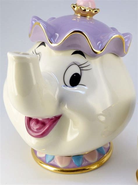 Bule Porcelana Desenho Bela E A Fera Disney Coleção Ouro 24k - R$ 589,00 em Mercado Livre