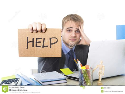 Young Desperate Businessman Holding Help Sign Looking Worried Suffering