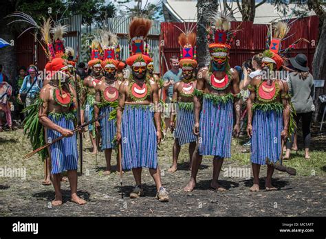 A Group Of Warriors With Face Painting Ready To Parade Mount Hagen