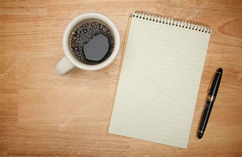 Cup Of Coffee Blank Pad And Pen On Wood — Stock Photo © Feverpitch
