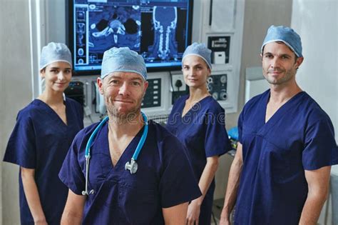 Your Health Is Important To Us Portrait Of A Team Of Surgeons In A