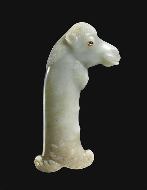 143 A Mughal Carved Jade Dagger Hilt In The Form Of A Camel Head