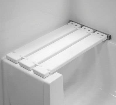 Made of aluminum with covers on the ends so it does not slip. Removable Bathtub Seat | Tub Seat | Bathtub Bench Seat