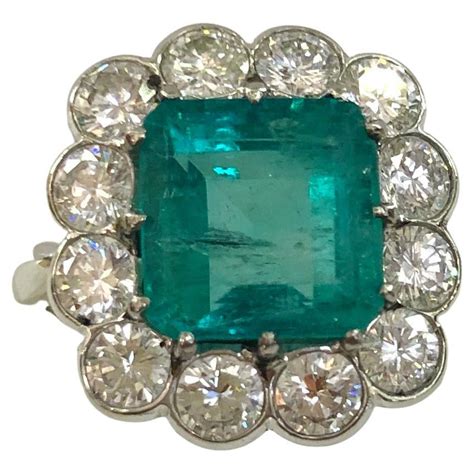 18 karat white gold emerald and diamond ring for sale at 1stdibs