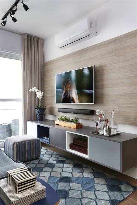 No matter how small your apartment you can create two livable spaces say a living room and a bedroom using the tv as a room divider. 25 Best Modern TV Unit Design for Living Room - Decor Units