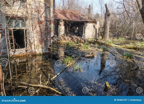 Old Destroyed And Abandoned House Is Flooded With Water Stock Image