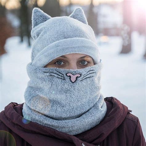 Why are my cat's ears warm? The cat set: cap with cats ears, cowl with cats nose and ...