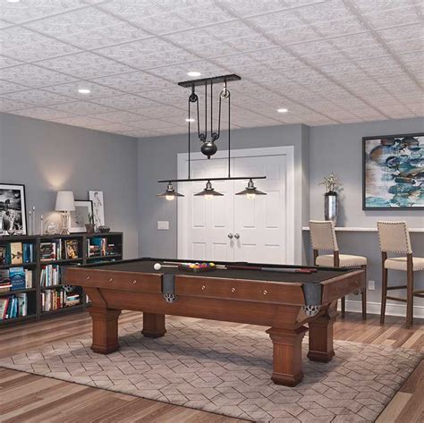 Whether you decide to transform this extra living for a more contemporary space, consider black ceiling panels, which feel like a real cinema and absorb up to 50% of sounds that strike their surface. 9 Simple DIY Basement Ceiling Projects anyone can do