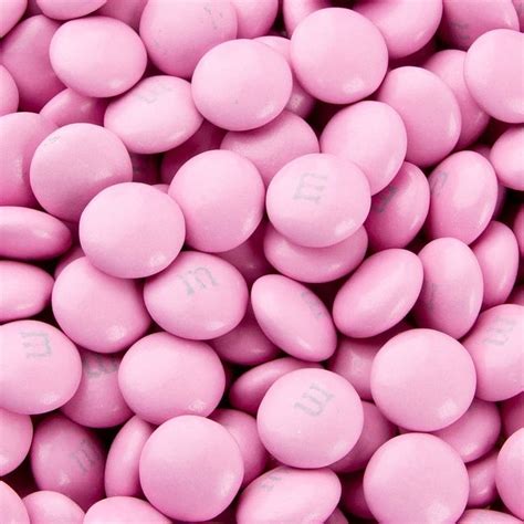 Pink Candy Candies With The Word Love Written On Them In Small Letters