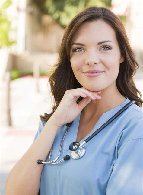 Young Adult Woman Doctor Or Nurse Portrait Outside Stock Photo Image