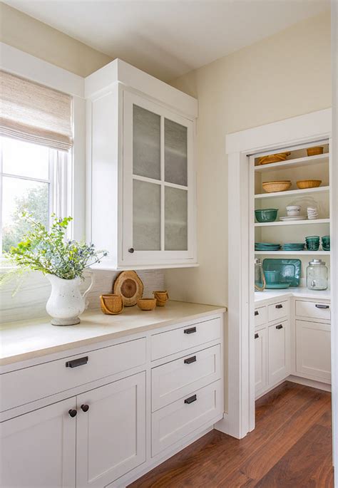 Corner pantry cabinets help to create different varies of interior decoration. Beach House with Neutral Interiors - Home Bunch Interior ...