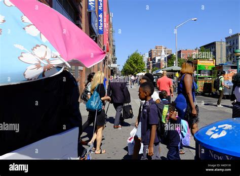 Pedestrians On 125th Street The Main Street Of Harlem Harlemnew
