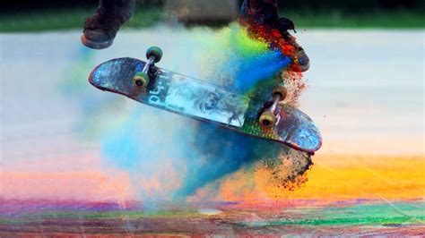 Chromatic 2 Skateboarders Moving In Slow Motion Through Brightly