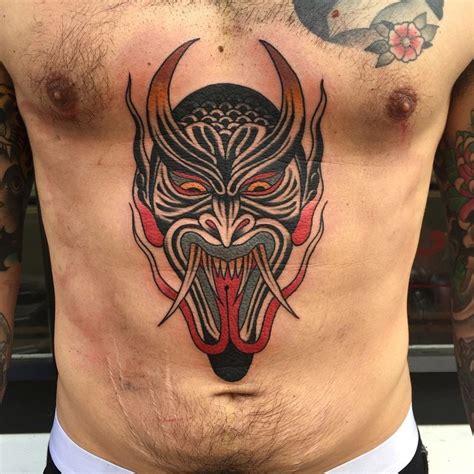 The sticking out of the tongue is a symbol. Traditional Devil - Cloak and Dagger Tattoo Parlour London