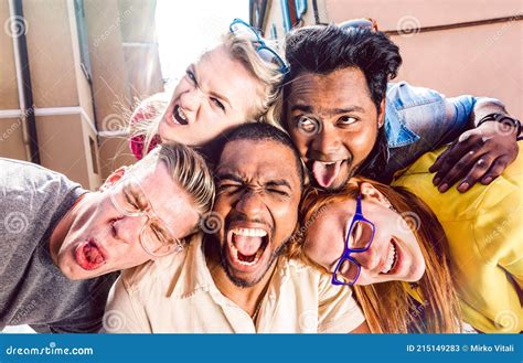 Multiracial Millenial Friends Taking Selfie Sticking Out Tongue With