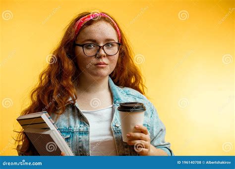 Portrait Of Funny Cheerful Redhead Girl Wearing Big Pink Glasses Stock