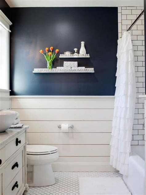 Navy Accent Wall Over White Shiplap In Country Bathroom With Subway