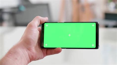 Holding Green Screen Phone Stock Video Motion Array