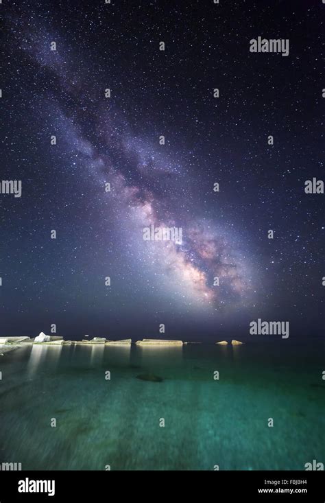 Night Landscape With Milky Way At The Sea Coast With Stones Starry Sky