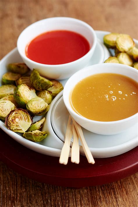 Roasted Brussels Sprouts With Dips By Stocksy Contributor Harald