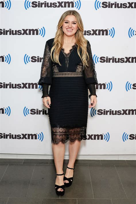 Kelly Clarkson Shows Off Weight Loss As She Stuns In Sheer Lacy Black Dress For Radio Show