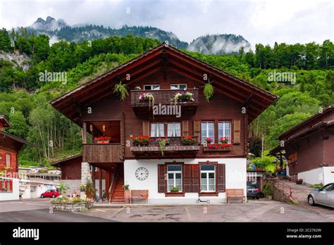 Traditional Wood House In Swiss Village Iseltwald Switzerland Stock