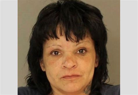 Woman Charged With Robbing Convenience Store At Gunpoint