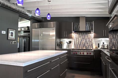 I ordered a sandtex stainless steel backsplash, and commerce delivered it within the week! Black and Gray Contemporary Kitchen With Stainless Steel ...