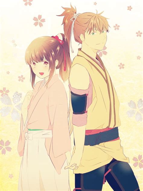 Two Anime Characters Standing Next To Each Other In Front Of Flowers