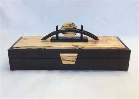 Their tradition, spirit and use. 'Sunrise' Japanese style box in bog oak and spalted birch ...