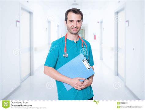 Male Nurse Portrait On Hospital Corridor Background Stock Photo Image