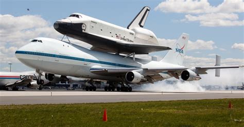Space Shuttle Enterprise Lands In Nyc Atop Jet