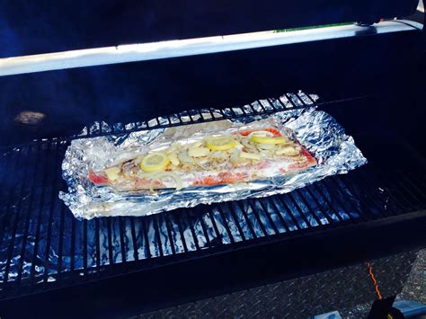 This is how you smoke salmon on the traeger grill: Traeger smoked salmon with lemon & garlic | Yummy food