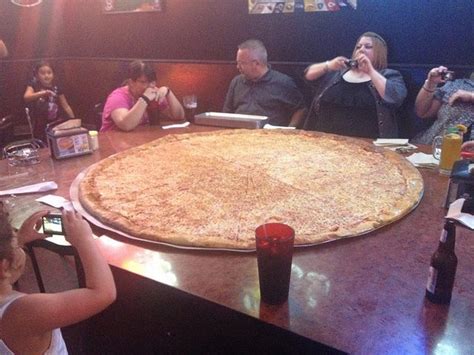 At 6 slices, each slice consists of 13 square inches. The massive 62 inch at Big Lou's Pizza | Food, Pizza, Desserts