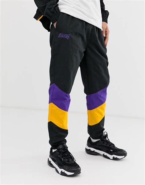 Trainingsanzug trikot fussball trends psg nike adidas originals jogginghosen der trainingsanzug für herren ist ein funktionales fashion piece. New Era - NBA LA Lakers - Schwarze Trainingshose mit ...