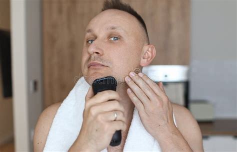 Daily Routine Male Self Care Handsome Young Unshaven Man With Towel On