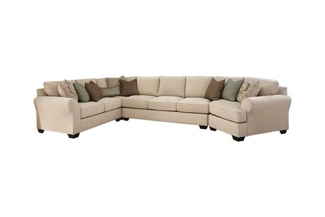 Wilcot 4 Piece Sectional With Cuddler Ashley Furniture Homestore