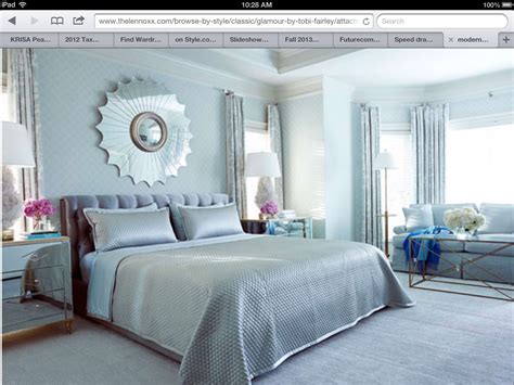 Personal tastes will ring through the rooms design offering a thoughtful and chic space. modern chic light blue silver bedroom design sun mirror ...