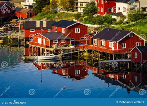 Norwegian Fishing Village With Traditional Red Rorbu Huts Reine